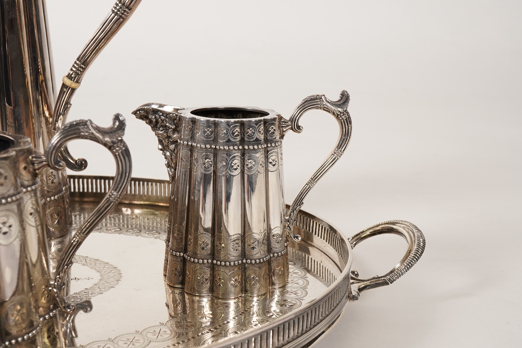 A late Victorian five piece silver tea and coffee service, all pieces with makers marks for John Edward Bingham and Walker & Hall